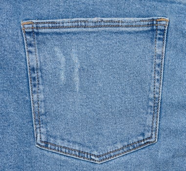 Back pocket of blue jeans photo