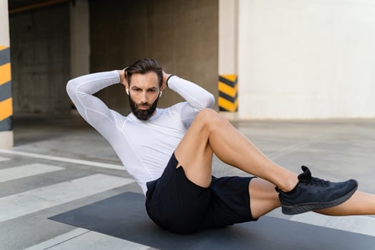 athletic strong hansome man on morning fitness workout exercise photo