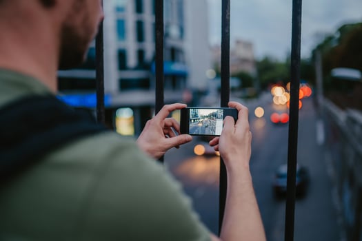 handsome hipster man walking in street photo
