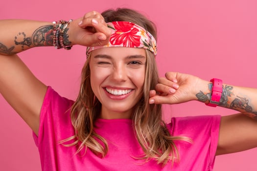 pretty cute smiling woman in pink shirt boho hippie style accessories smiling photo