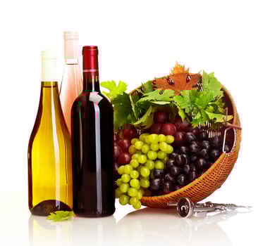 Red and White bottles of wine photo