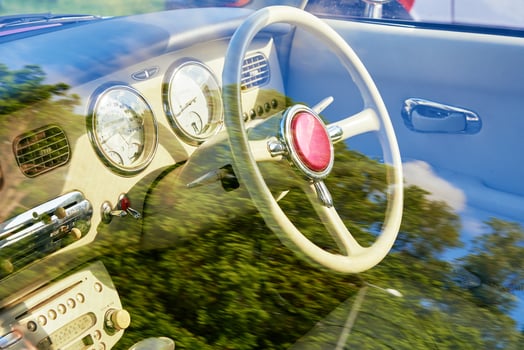 Retro car dashboard with srteering wheel photo
