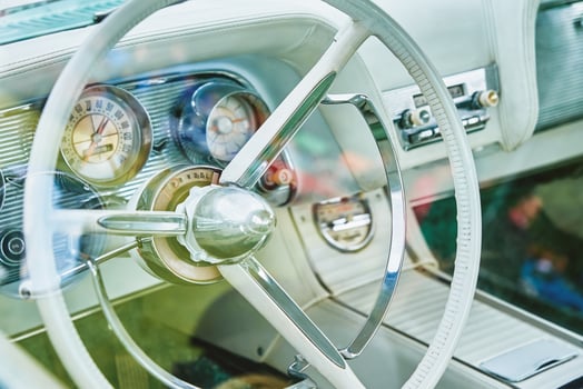 Retro car dashboard with srteering wheel photo