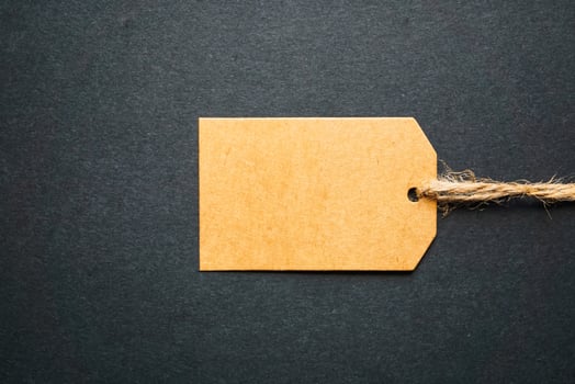 recyclable price tag on black background photo