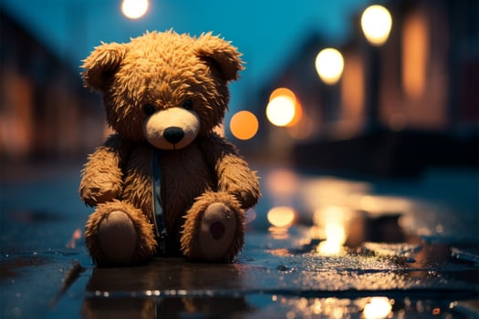 Amidst rain, a sad teddy bear rests on desolate night street AI Generated photo