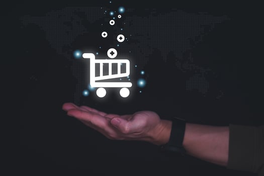 planning and strategy, business growth, progress or success concept, shopping cart is displayed as a virtual hologram on male hand, online shopping, information search, marketing online photo