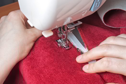 modern sewing machine presser foot and zipper photo