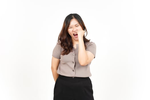 Fist with Angry Face Expression Of Beautiful Asian Woman Isolated On White Background photo
