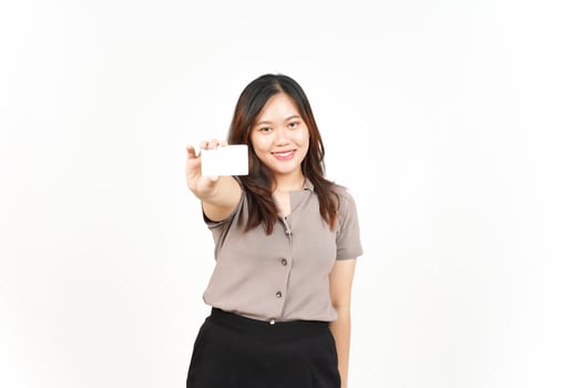 Holding and Showing Blank Credit Card Of Beautiful Asian Woman Isolated On White Background photo