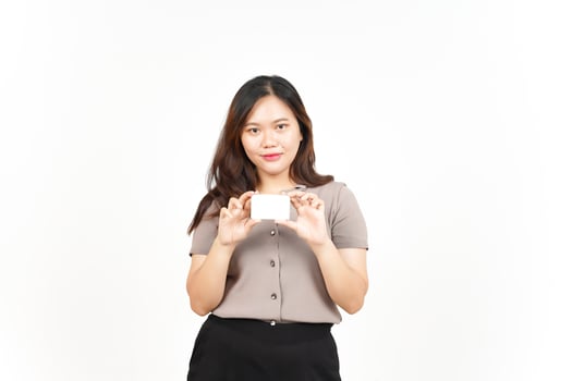 Holding and Showing Blank Credit Card Of Beautiful Asian Woman Isolated On White Background photo
