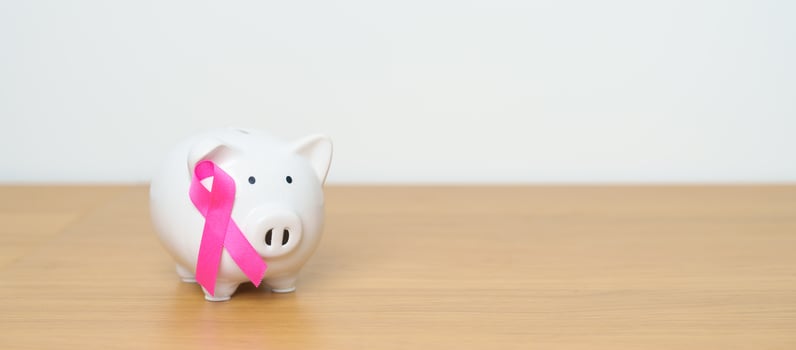 October Breast Cancer Awareness month, Pink Ribbon with Piggy Bank for support illness life. Health, Donation, Charity, Campaign, Money Saving, Fund, women day and World cancer day concept photo