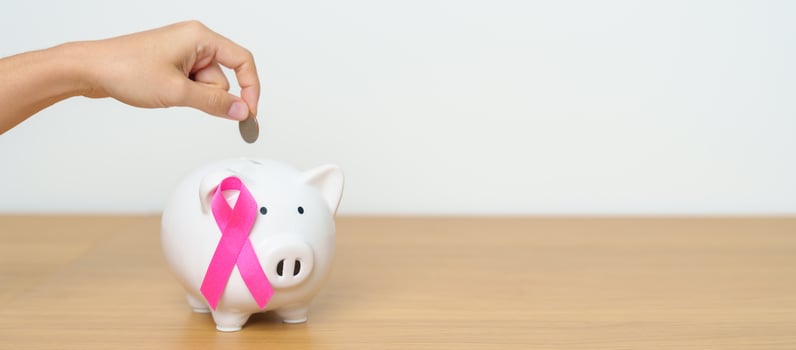 October Breast Cancer Awareness month, Pink Ribbon with Piggy Bank for support illness life. Health, Donation, Charity, Campaign, Money Saving, Fund, women day and World cancer day concept photo