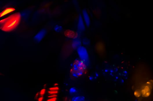 defocused light bokeh of christmas light tree,happy new year and Christmas holiday background photo