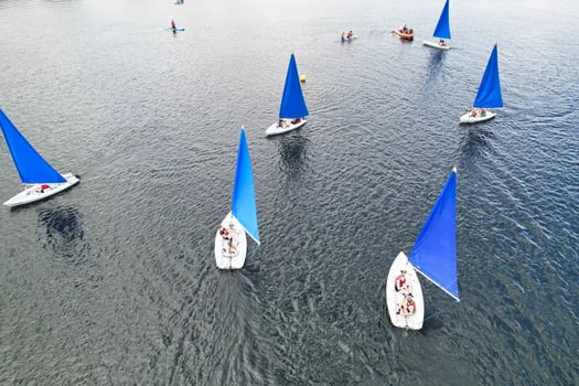 High Angle footage of People are Boating at Caldecotte Lake Located at Milton Keynes City of England Great Britain UK. The Aerial Landscape Was Captured on August 21st, 2023 with Drone's Camera photo