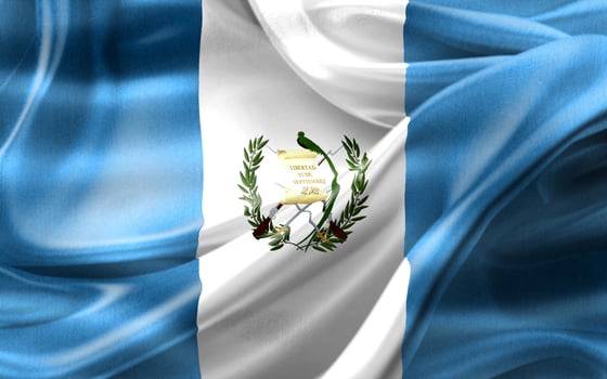 Guatemala flag - realistic waving fabric flag photo