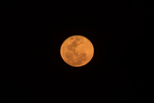 Full moon on dark sky photo