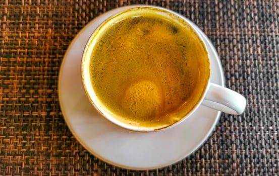 Cup of americano black coffee in restaurant cafe in Mexico. photo