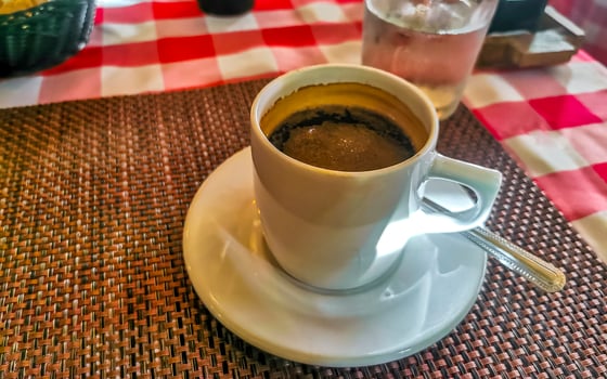 Cup of americano black coffee in restaurant cafe in Mexico. photo