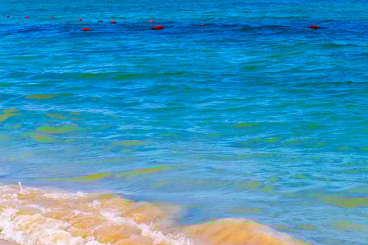 Waves at tropical beach caribbean sea clear turquoise water Mexico. photo