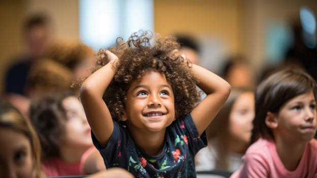 A group of diverse students eagerly raise their hands in a classroom ready for a new school year photo