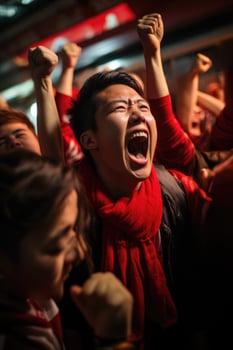 A group of passionate fans roar in excitement as the football season kicks off with a thrilling game photo