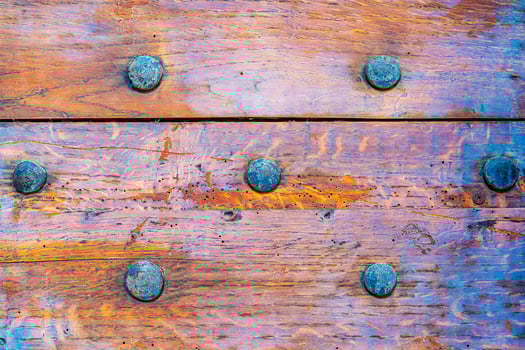 close-up of a wooden panel texture -  brown old wooden board background photo