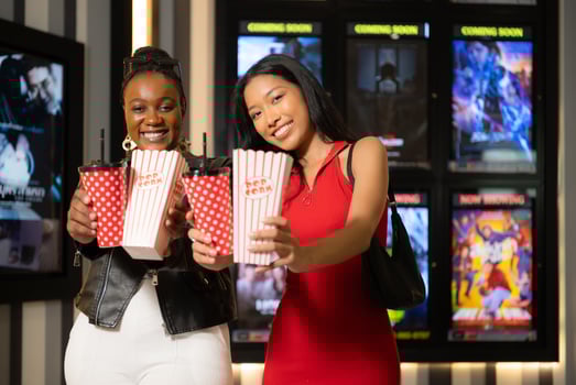 Popcorn and drinking glass a companion item of people for watching movies in the cinema. photo