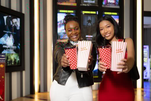 Popcorn and drinking glass a companion item of people for watching movies in the cinema. photo