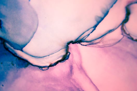 The picture is painted in alcohol ink. Abstraction will perfectly fit into a modern interior. Closeup of the painting. Colorful abstract painting background. photo