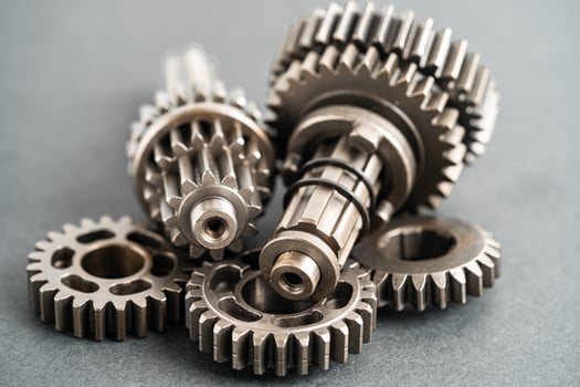 Gear and cogs wheels, clock mechanism, brass metal engine industrial. photo