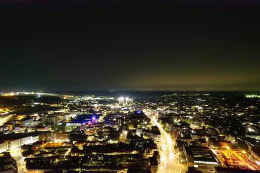 Aerial View of Illuminated Downtown Buildings, Roads and Central Luton City of England UK at Beginning of Clear Weather Night of September 5th, 2023 photo