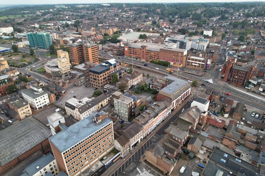 Aerial View of Illuminated Downtown Buildings, Roads and Central Luton City of England UK at Beginning of Clear Weather Night of September 5th, 2023 photo
