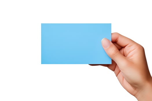 A human hand holding a blank sheet of blue paper or card isolated on white background. ai generated photo