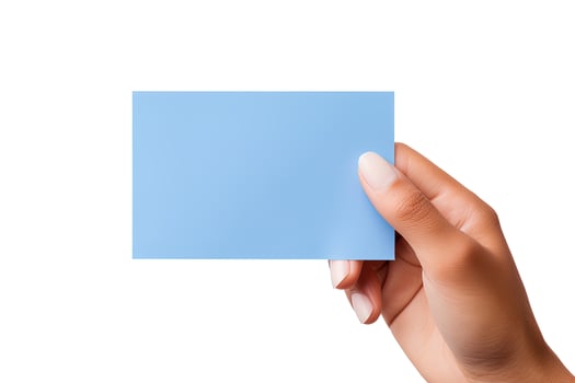 A human hand holding a blank sheet of blue paper or card isolated on white background. ai generated photo