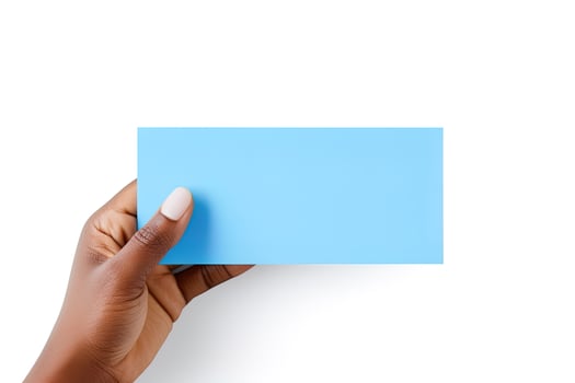 A human hand holding a blank sheet of blue paper or card isolated on white background. ai generated photo
