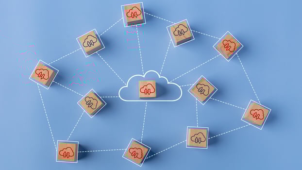 Cloud computing concept. Cloud icons on connected wooden cubes. The idea of sharing or transferring data online. photo