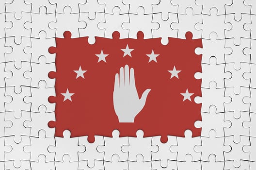 Abkhazia flag in frame of white puzzle pieces with missing central part photo