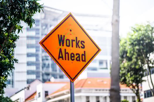 works ahead road sign. caution notice for industrial access only to works site photo
