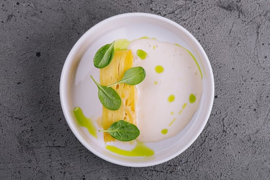 potato gratin in creamy basil sauce photo