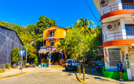 Puerto Escondido Oaxaca Mexico 2023 Typical beautiful colorful tourist street sidewalk city Puerto Escondido Mexico. photo