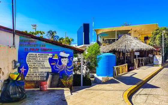 Puerto Escondido Oaxaca Mexico 2023 Typical beautiful colorful tourist street sidewalk city Puerto Escondido Mexico. photo