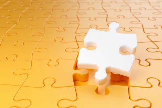 White jigsaw puzzle among a yellow jigsaw puzzle that shows outstanding Differentiation and Selection photo