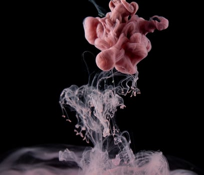 Abstract fluid acrylic painting. Marbled pink abstract Ink cloud on black background. Liquid marble pattern. Modern art. photo