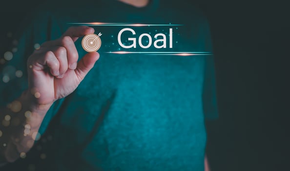 The person showing hologram Goal text in hand, progress concept or success concept, global data connection, big data, data search, big data, and business process. photo