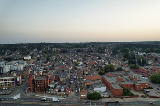 Aerial View of Illuminated Downtown Buildings, Roads and Central Luton City of England UK at Beginning of Clear Weather Night of September 5th, 2023 photo