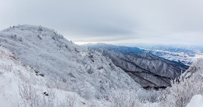 Snow-capped Deogyusan mountains on a clear day  in winter, South Korea. photo