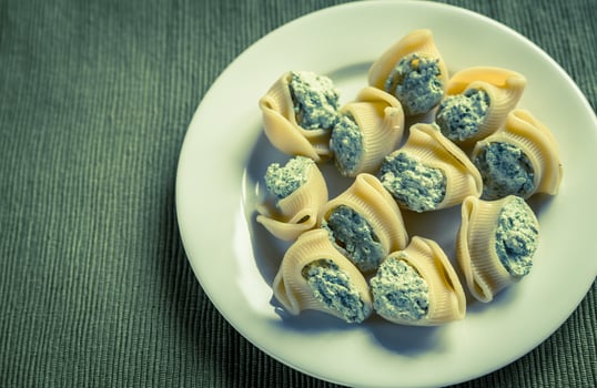 Stuffed lumaconi with cheese photo