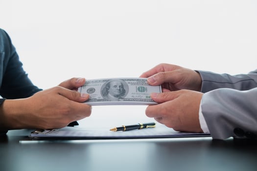Businessmen pay kickbacks to government officials to facilitate real estate investments and large kickbacks also protect against project faults and shortcomings. concept kickbacks for convenience. photo