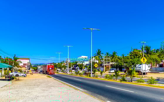 Puerto Escondido Oaxaca Mexico 2023 Typical beautiful colorful tourist street sidewalk city Puerto Escondido Mexico. photo