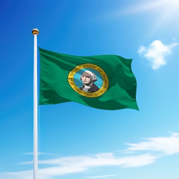 Waving flag of Washington is a state of United States on flagpole photo